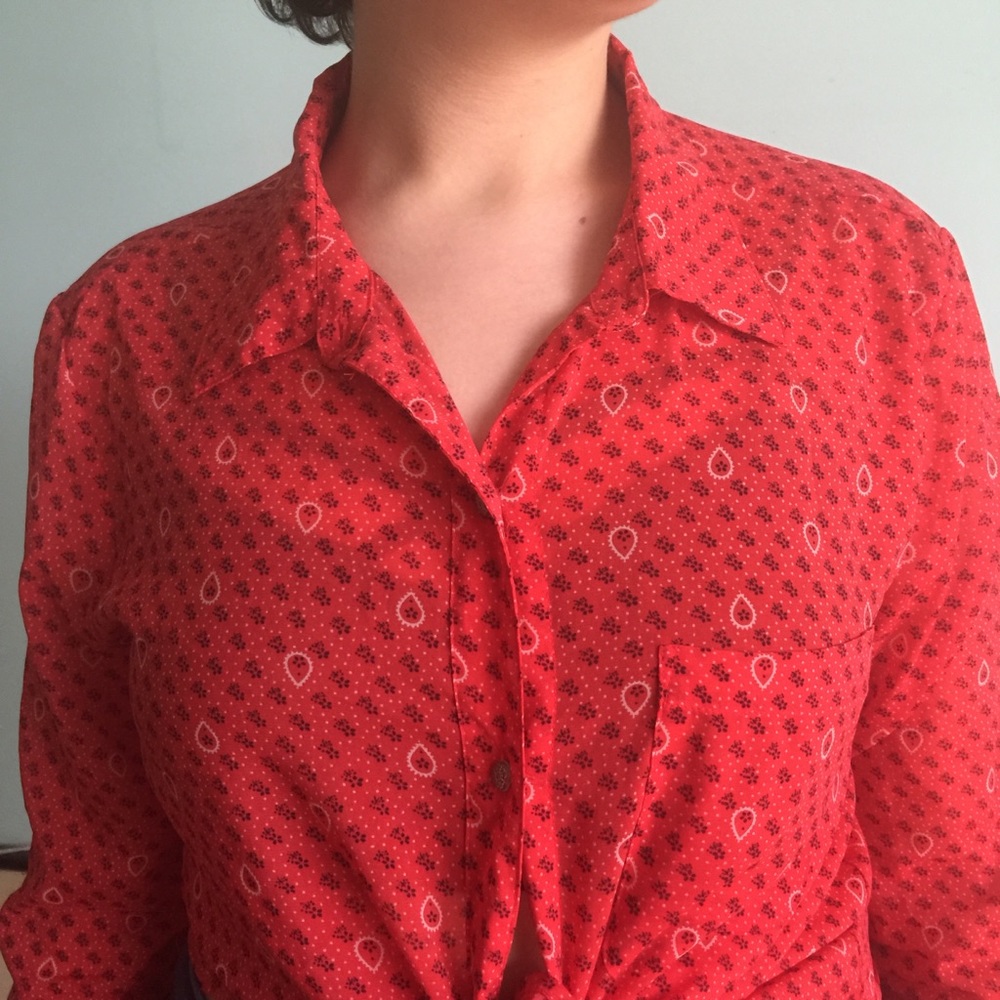 Red button-up with brass buttons